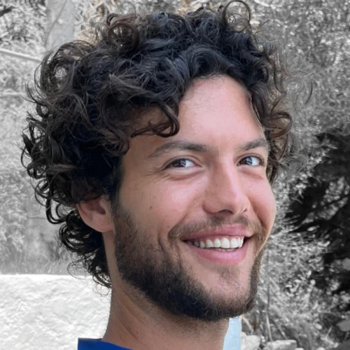 Headshot of Orfeas, smiling